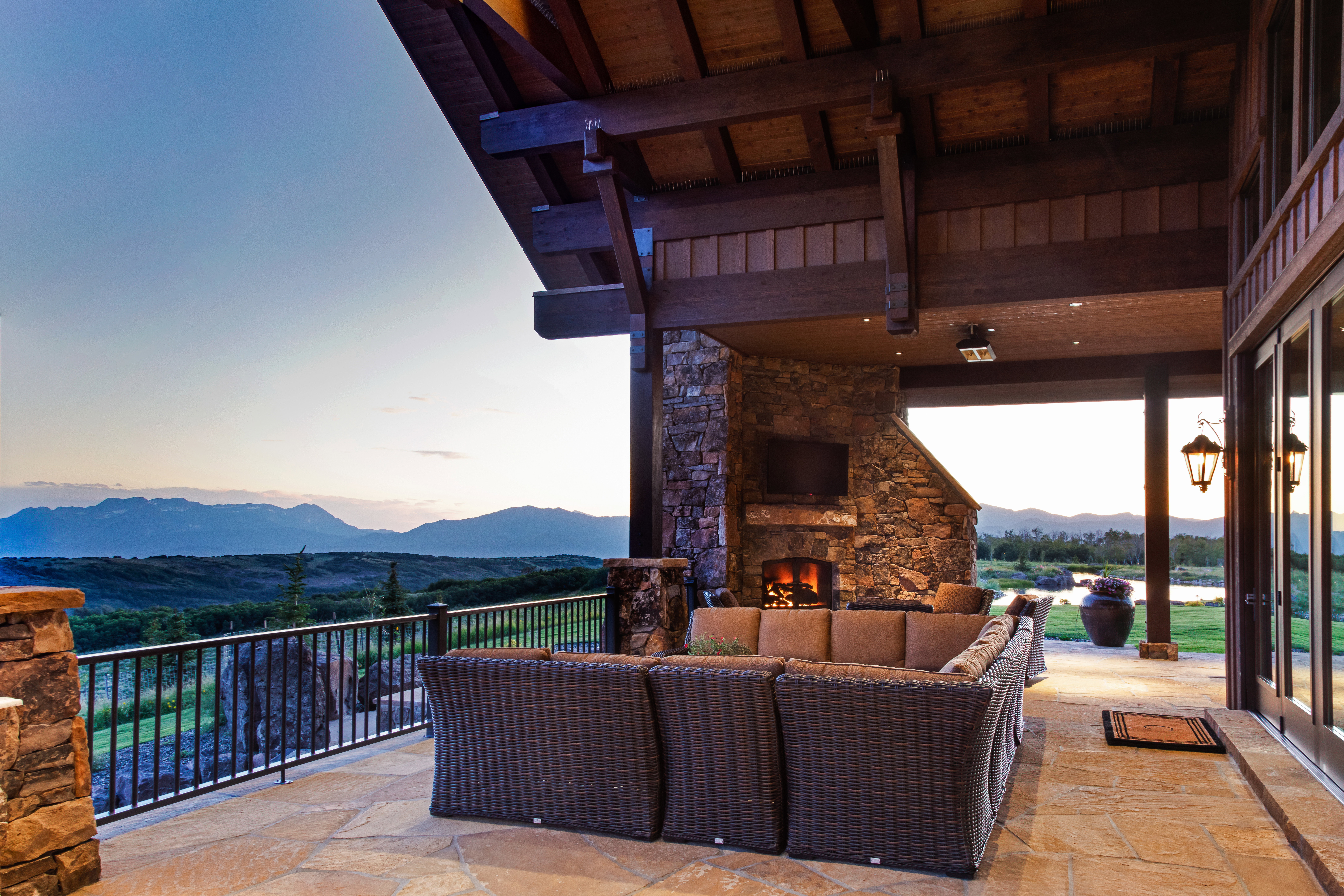 View of patio / terrace with an outdoor living space with a fireplace