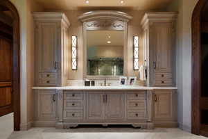 Bathroom featuring vanity and recessed lighting