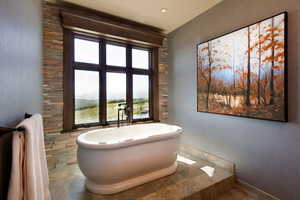 Bathroom with a freestanding bath