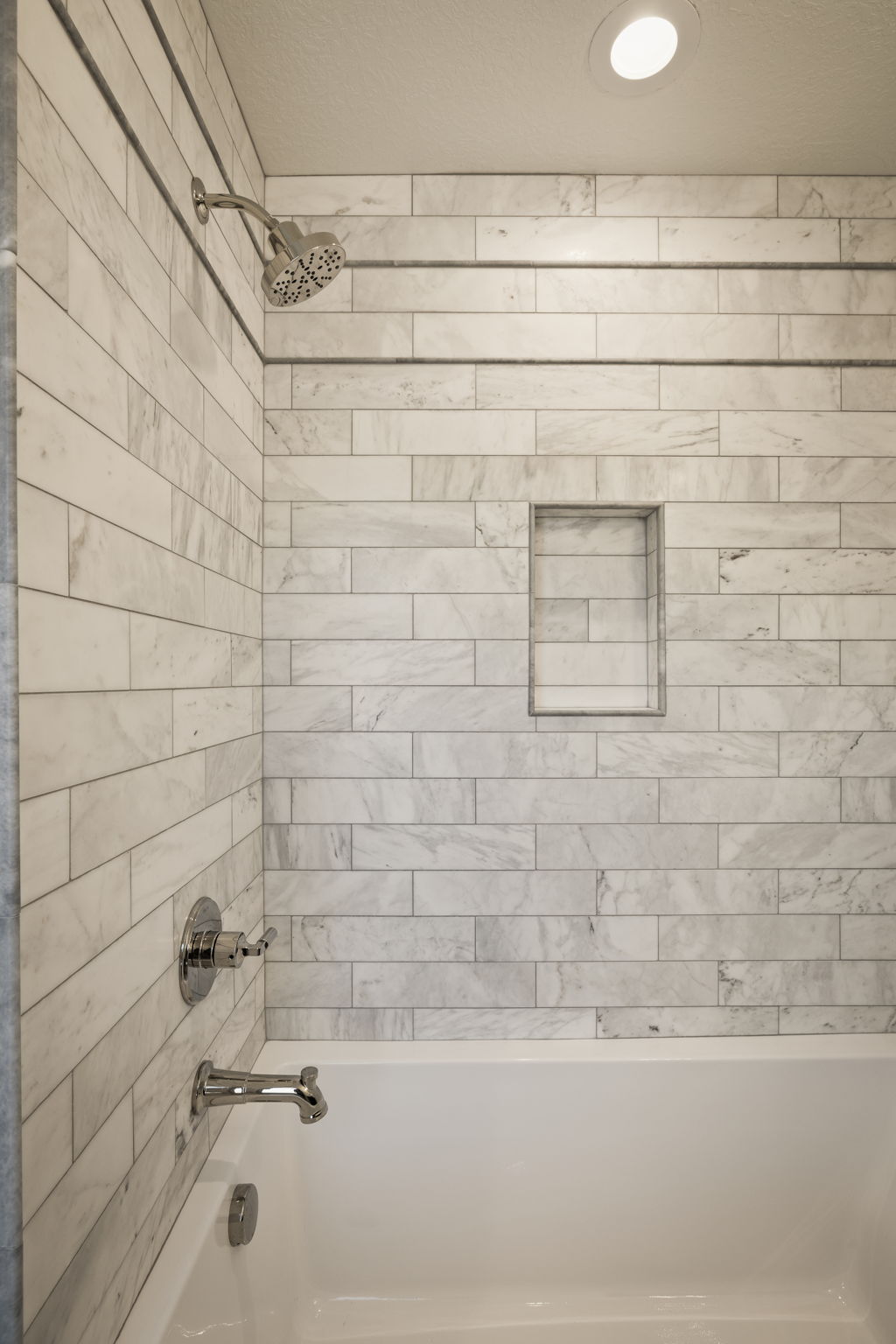 Bathroom with bathing tub / shower combination