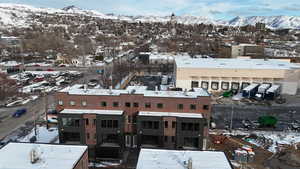 Snowy aerial view with a mountain view
