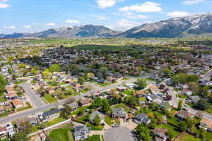 Aerial view of residential area featuring mountains