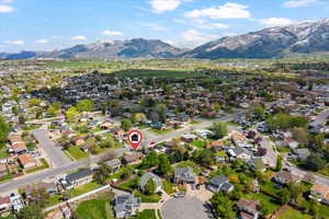 Aerial view of residential area featuring mountains