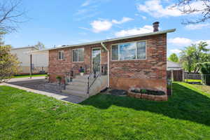 Ranch-style house featuring brick siding