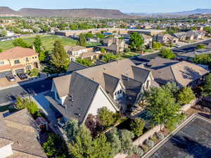 Aerial view of residential area featuring mountains