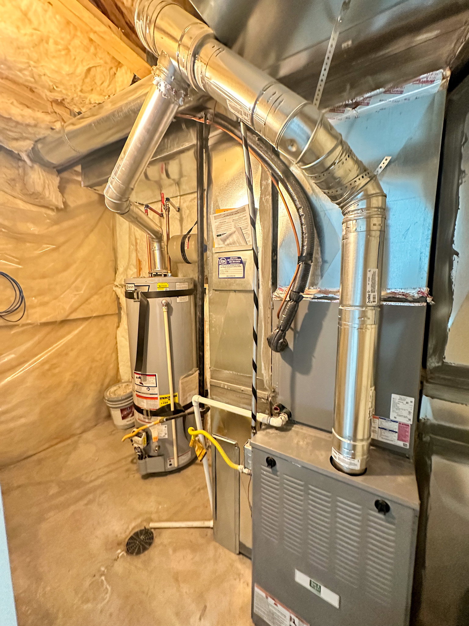 Utilities with strapped water heater and heating unit