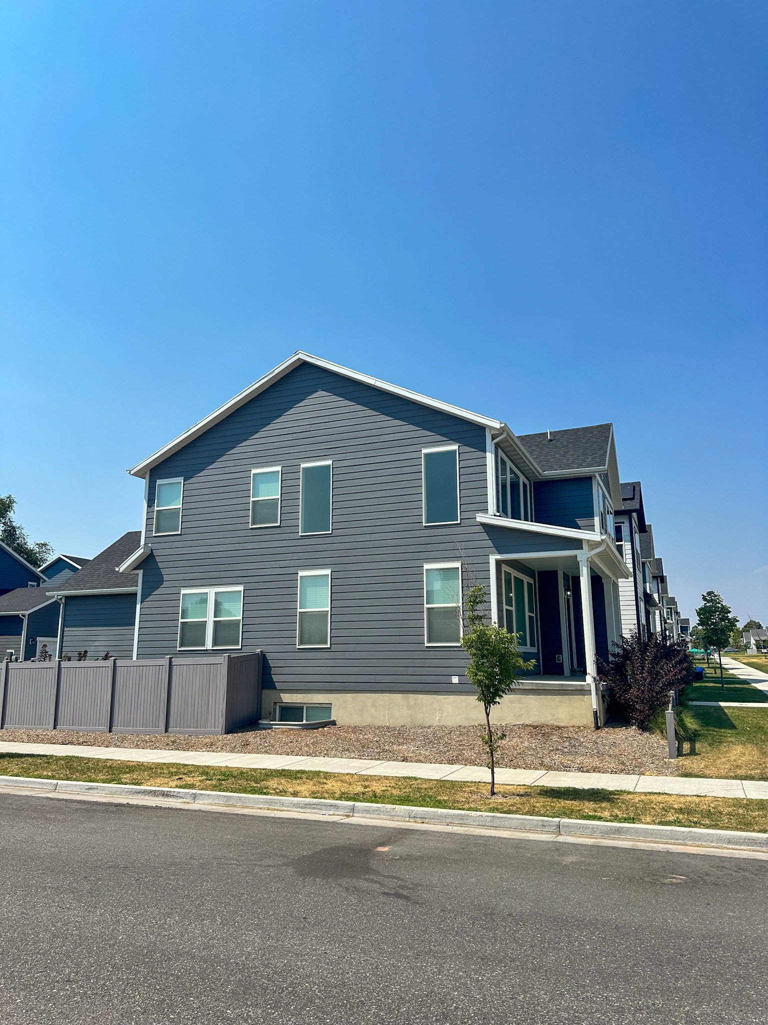 View of property exterior with a porch