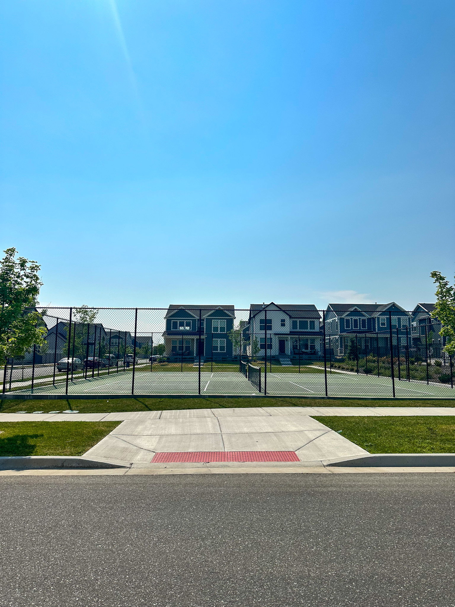 View of basketball court featuring a residential view