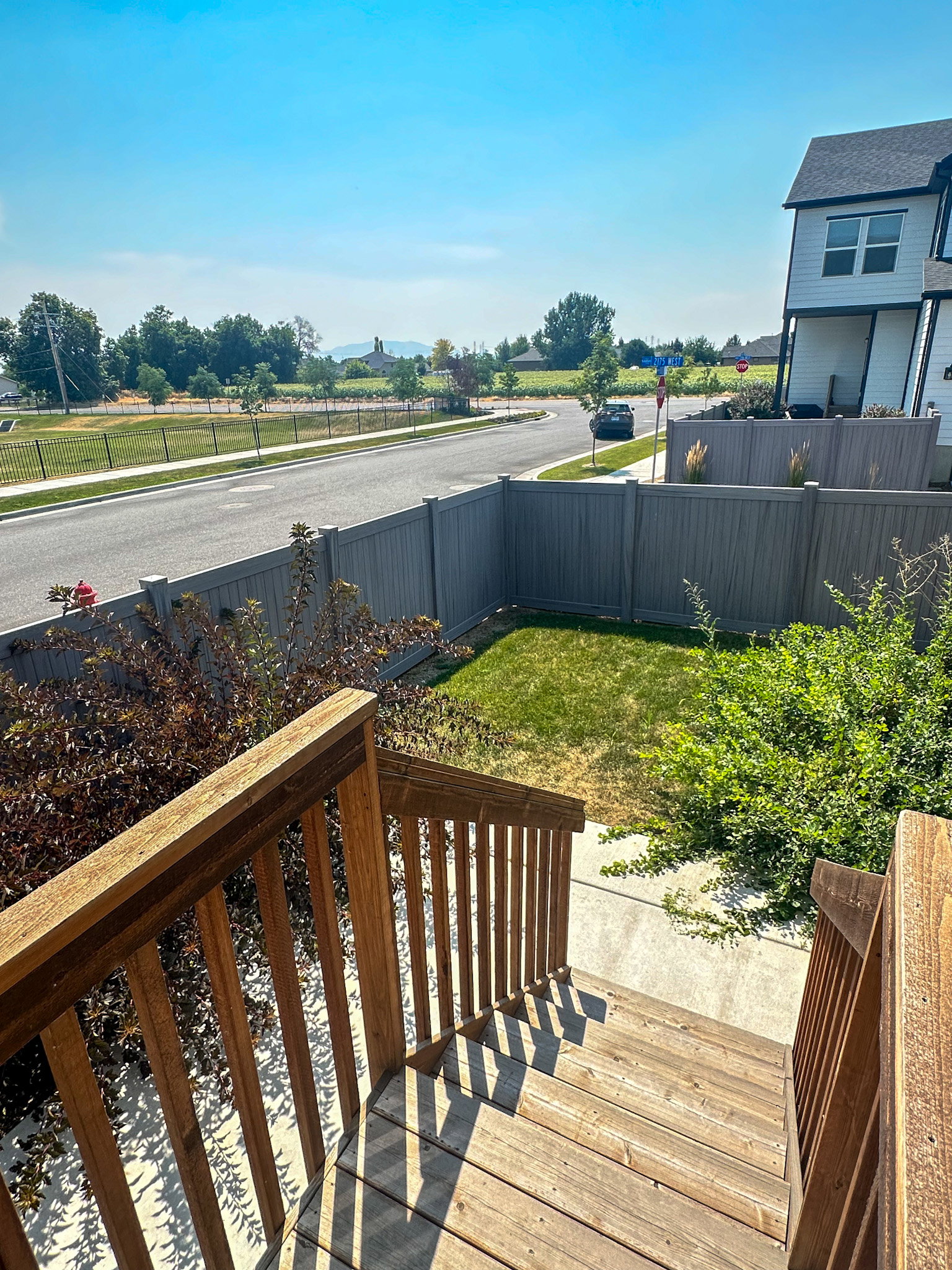 Wooden deck featuring a fenced backyard