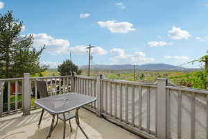 Balcony featuring a mountain view