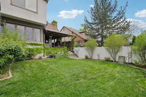 View of fenced backyard