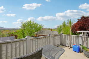 Patio / terrace featuring a mountain view