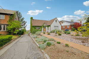 View of front of house with brick siding