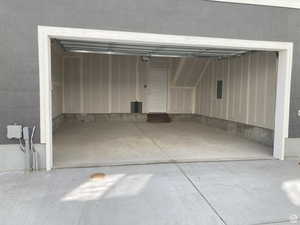 Garage featuring electric panel