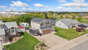 Aerial perspective of suburban area featuring a mountain backdrop