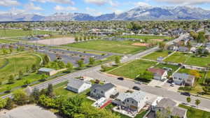 Aerial perspective of suburban area featuring mountains