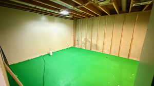 Below grade area featuring an area to practice putting