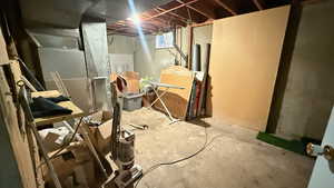 Below grade area with heating unit