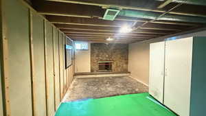 Below grade area with a fireplace