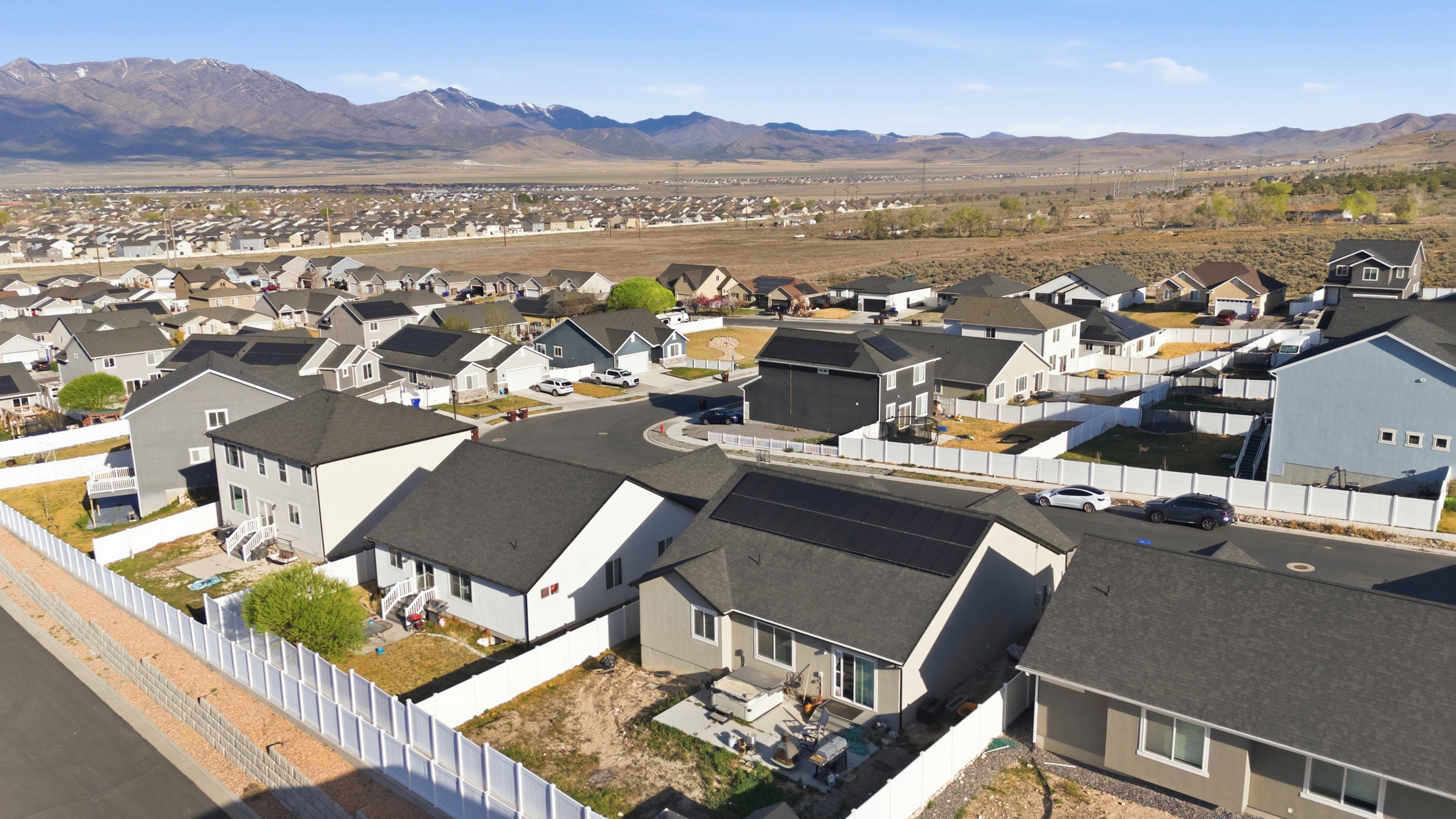 Aerial view of residential area with a mountain backdrop