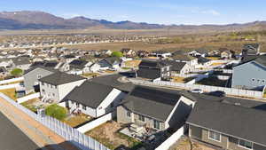 Aerial view of residential area with a mountain backdrop