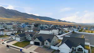 Aerial view of residential area with a mountain backdrop