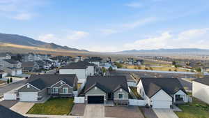 Aerial perspective of suburban area featuring mountains