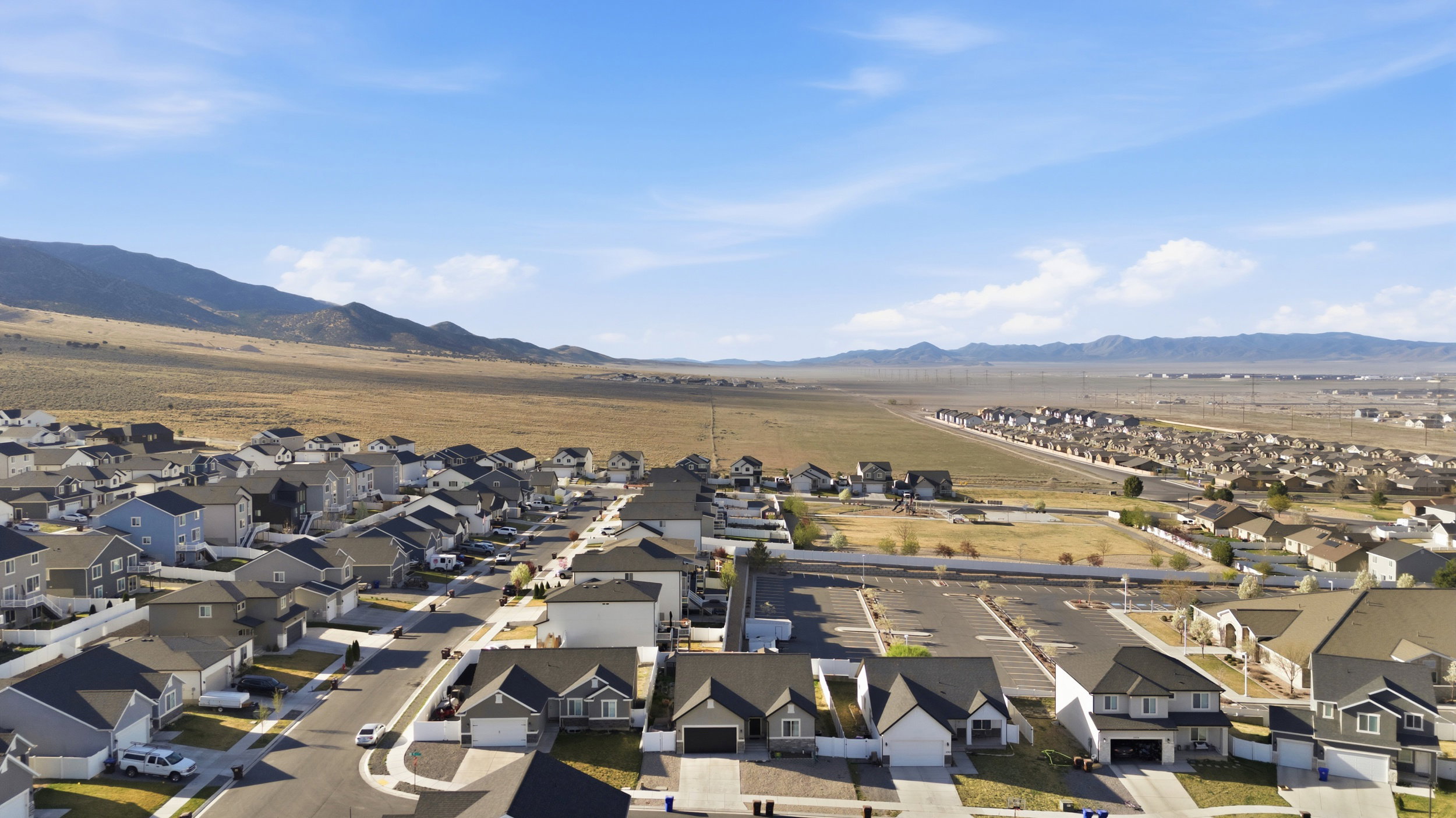 Aerial view of residential area with mountains