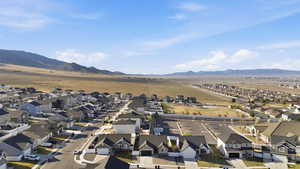 Aerial view of residential area with mountains