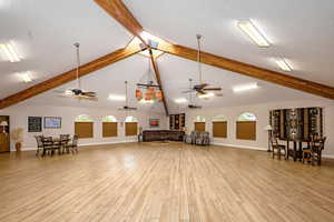 Misc room with healthy amount of natural light and ceiling fan