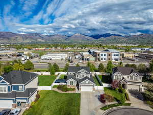 Aerial view of residential area with a mountain backdrop