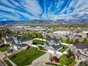 Aerial view of residential area with a mountain backdrop