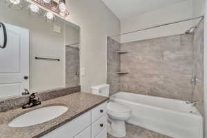 Full bathroom featuring vanity and shower / bathtub combination