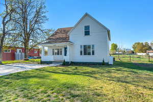 View of front of property featuring a porch