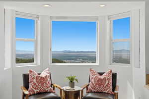 Sitting room featuring a mountain view and recessed lighting