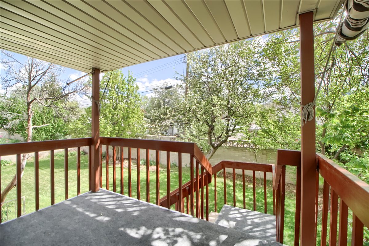 Deck featuring a yard