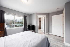 Spacious primary suite featuring large window