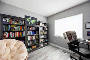 Bedroom #2 upstairs, with baseboards and LVP flooring