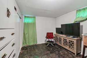 Office space with dark flooring