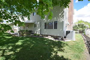 Back of property with a patio area