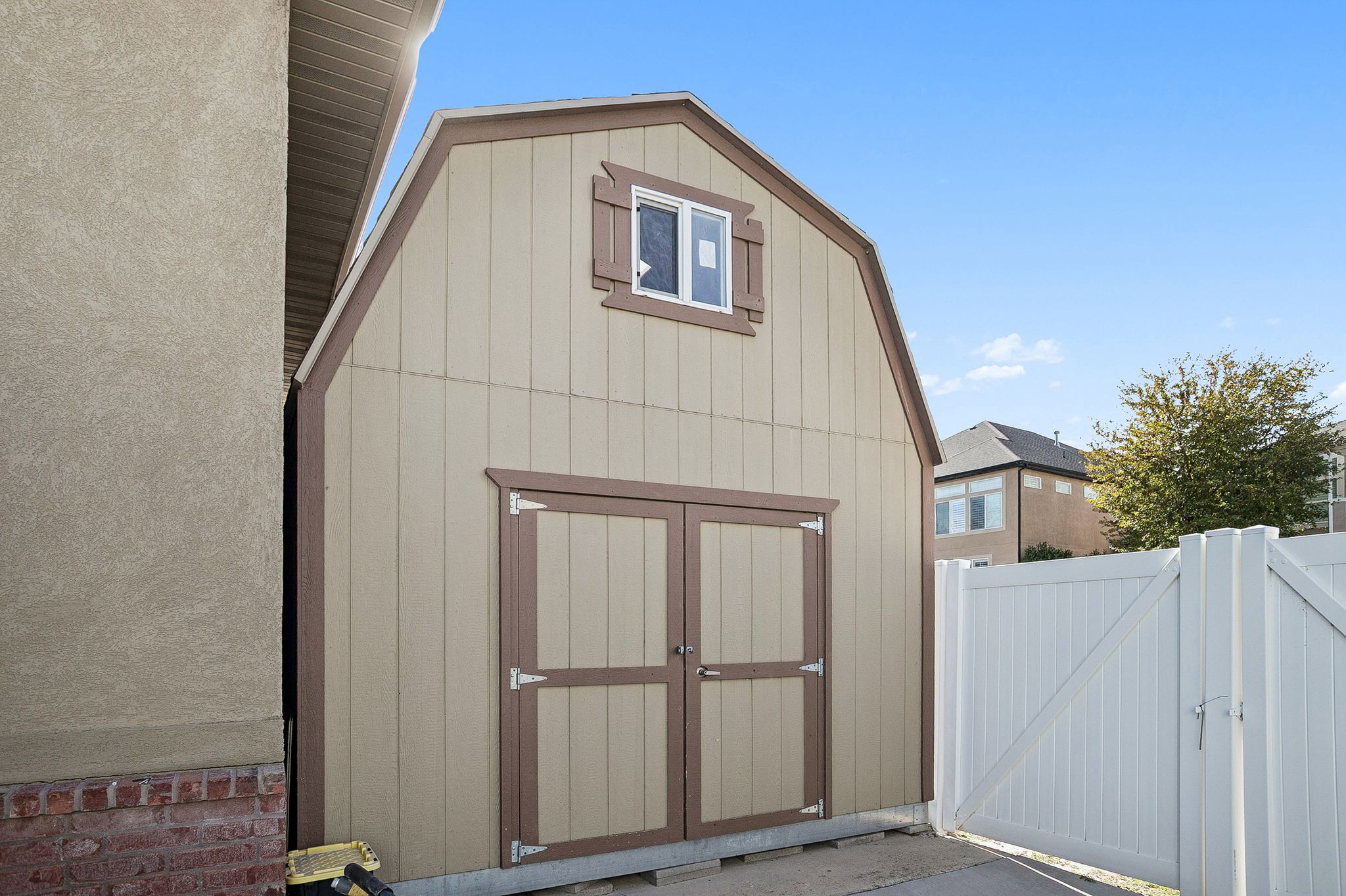 View of shed with a gate