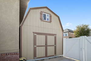 View of shed with a gate