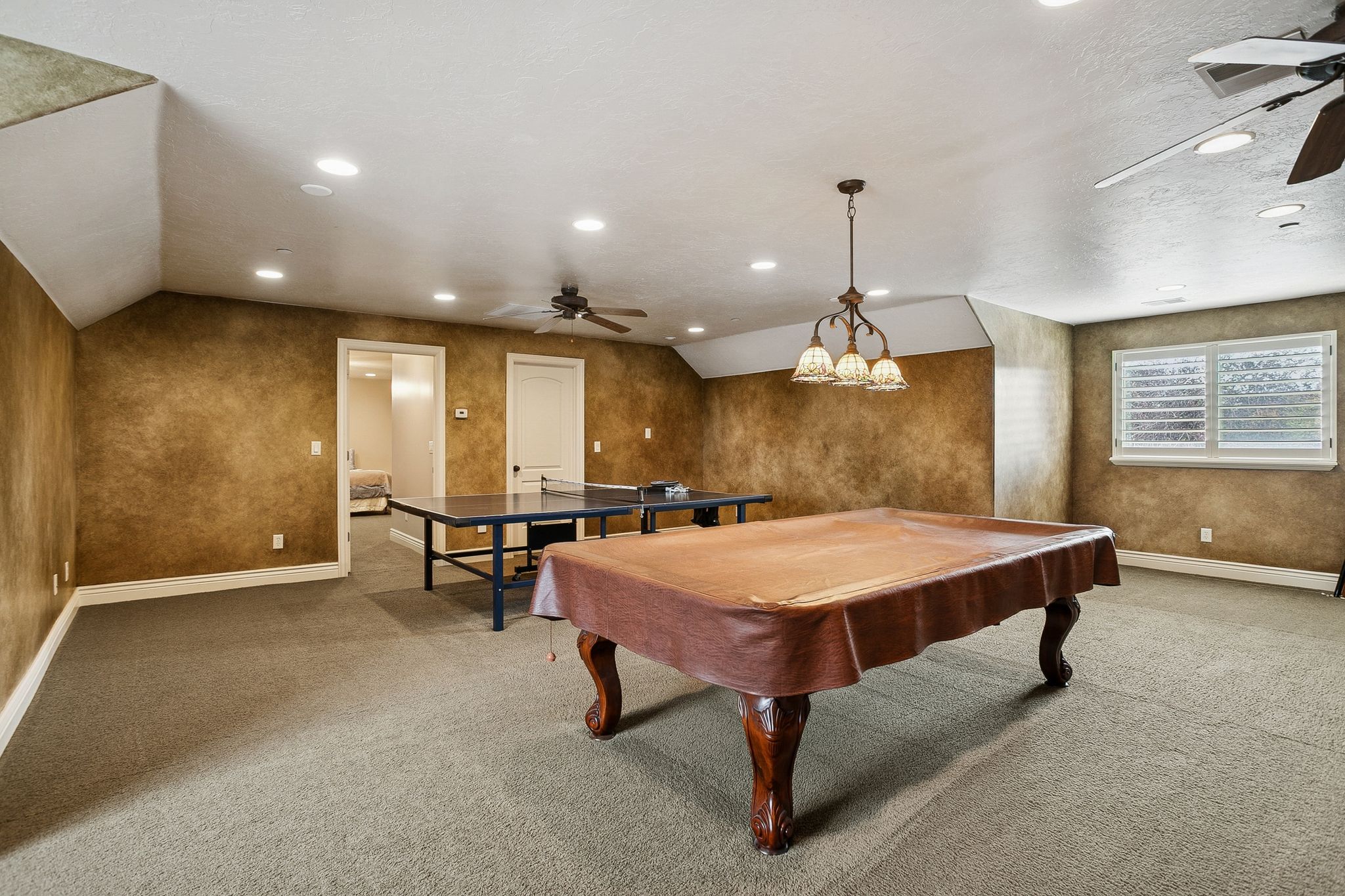 Rec room featuring ceiling fan, vaulted ceiling, pool table, and recessed lighting