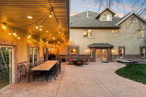 View of patio / terrace featuring outdoor dining space and french doors