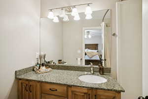 Ensuite bathroom featuring vanity