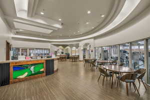 Reception with recessed lighting and a high tray ceiling