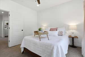 Bedroom featuring carpet floors, a ceiling fan, and recessed lighting