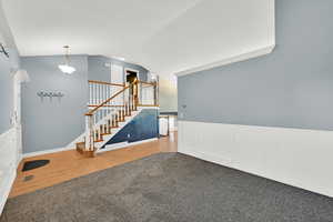 Stairs featuring carpet floors