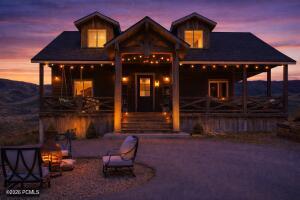 Back of house with a porch