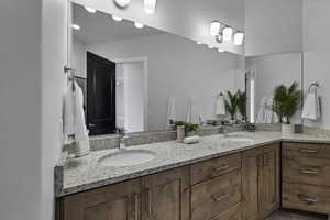 Full bathroom with double vanity